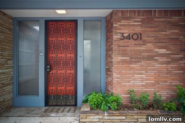Exterior view of 1952 Midcentury Modern home with Roman brick and native stone
