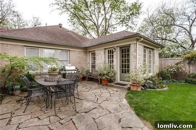 Dallas Weekend Open Houses: Explore Stellar New Listings 17 Lush landscaped backyard with flagstone patio and mature trees