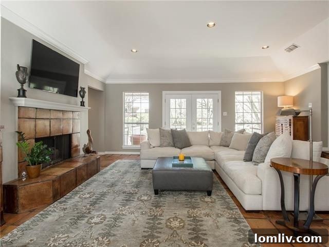 Spacious family room with gas log fireplace and comfortable seating