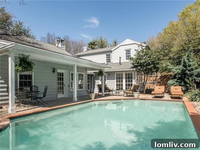 Dallas Weekend Open Houses: Explore Stellar New Listings 27 Inviting swimming pool and patio area in a private backyard setting