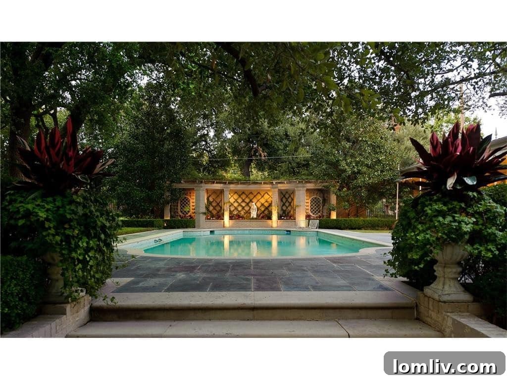 Dave Perry-Miller Curates Dallas' Finest Architecture: Korn, Thompson, Dilbeck 21 Pool and manicured grounds at 4248 Armstrong Parkway, showcasing outdoor living