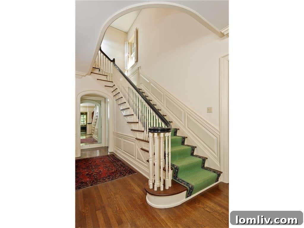 Dave Perry-Miller Curates Dallas' Finest Architecture: Korn, Thompson, Dilbeck 6 Grand staircase at 4248 Armstrong Parkway with classic Perkins interior