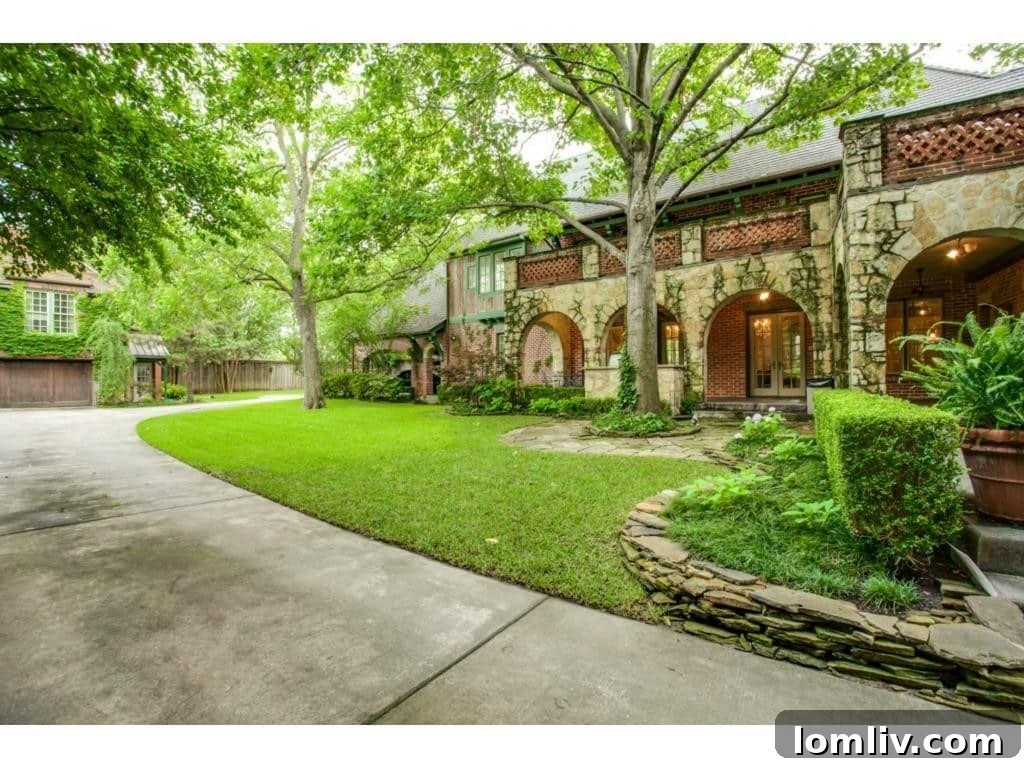 Rear exterior view of 6748 Lakewood Boulevard, showcasing the property's grandeur