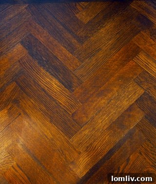 Foyer with chevron hardwood floors at The Mondara luxury condos
