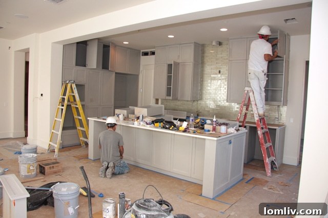Custom kitchen with Corian countertops, Ann Sacks tile, and Sub Zero/Wolf appliances at The Mondara