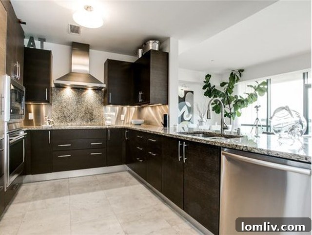 A spacious, modern kitchen with premium appliances in Unit 1208