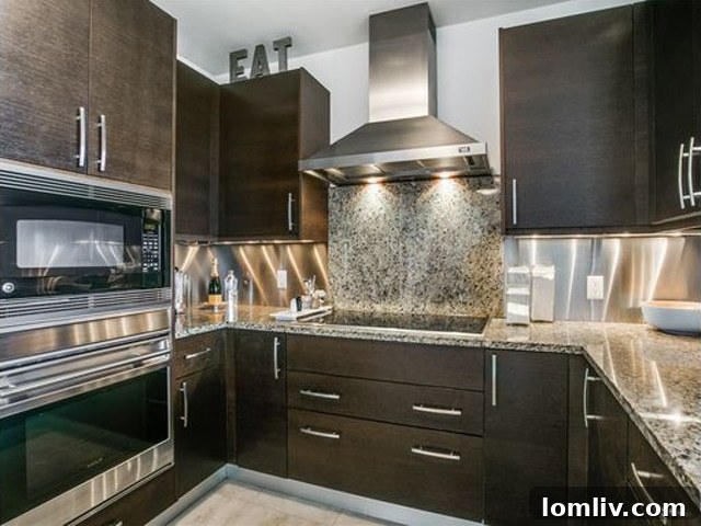 Open-concept kitchen in Unit 1208 connecting to living spaces