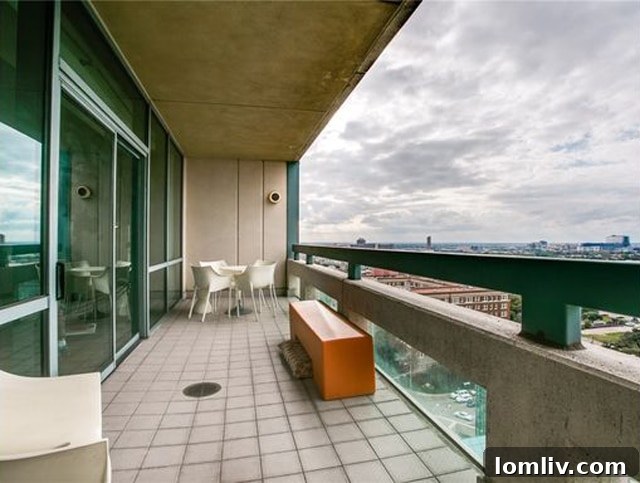 Stylish covered patio with structural railing and panoramic city views