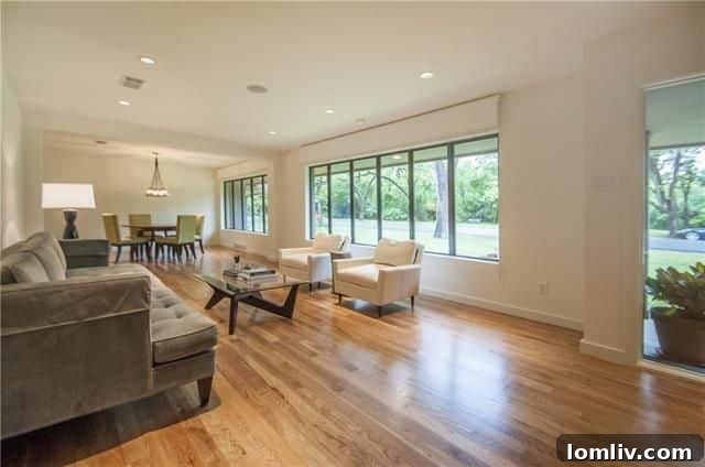 Luxurious living room with museum-finish walls and picture windows