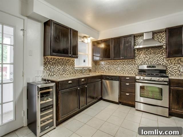 Spacious living area with hardwood floors in a duplex unit