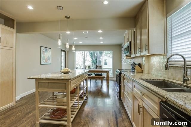 Kitchen with Granite Counters in Alger Park Home