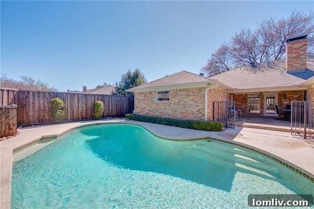 Backyard with Swimming Pool and Covered Patio