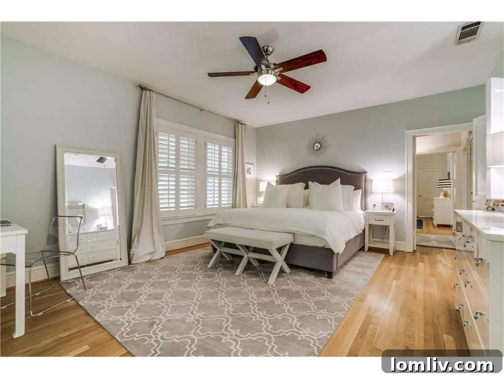Serene Master Bedroom with Space for Seating and Ample Natural Light