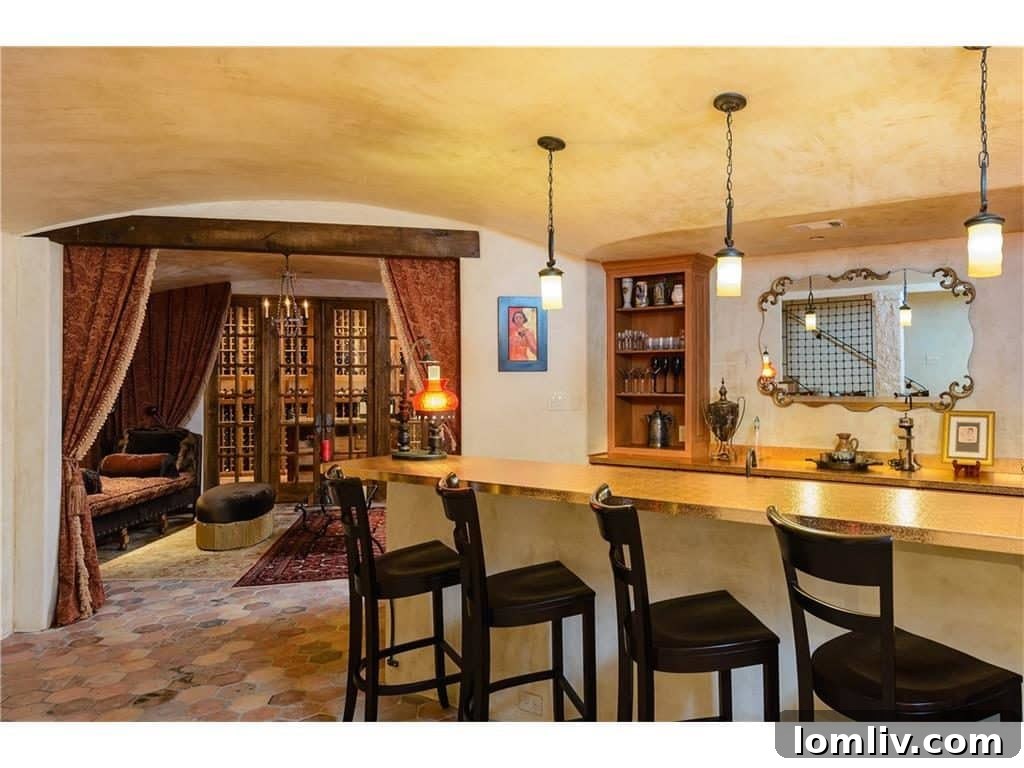 Entrance to the custom wine room with barrel ceiling