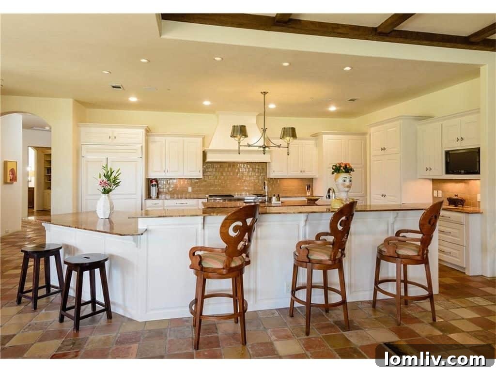 Gourmet kitchen with large island and high-end appliances, ideal for culinary creations