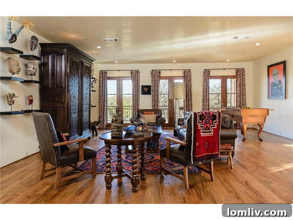 Luxurious upstairs game room with recreational facilities, ideal for family fun