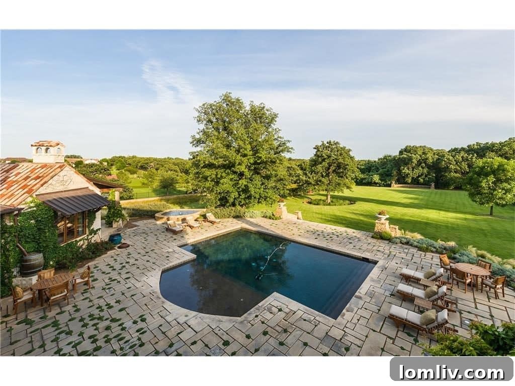 Bird's eye view of the 2252 King Fisher Drive estate within the Vaquero community, showcasing lush greenery