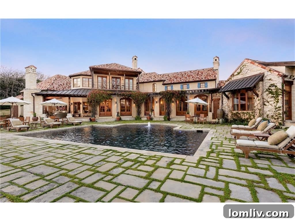Panoramic view of the sparkling pool and beautifully landscaped grounds