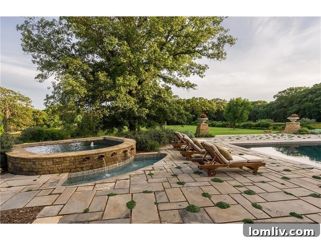 Inviting spa area adjacent to the main swimming pool, perfect for relaxation