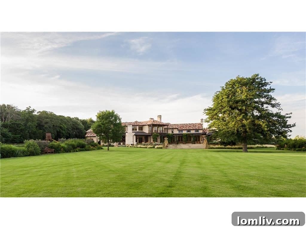 Long shot of the estate showcasing its grandeur and extensive landscaping, a true sanctuary