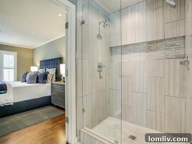 Luxurious master bathroom with a large frameless glass shower
