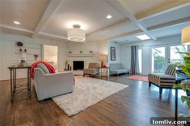 Inviting living room with fireplace and beamed ceilings