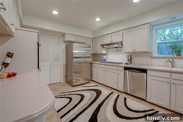 Bright and updated eat-in kitchen with modern appliances