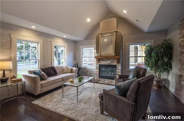 Cozy living room with shiplap gas fireplace and cathedral ceilings