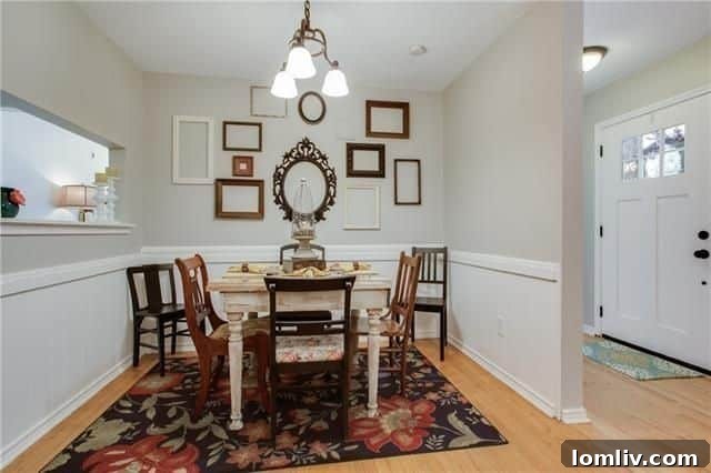 Bright and spacious living room with stone fireplace at 10664 Lakemere Dr