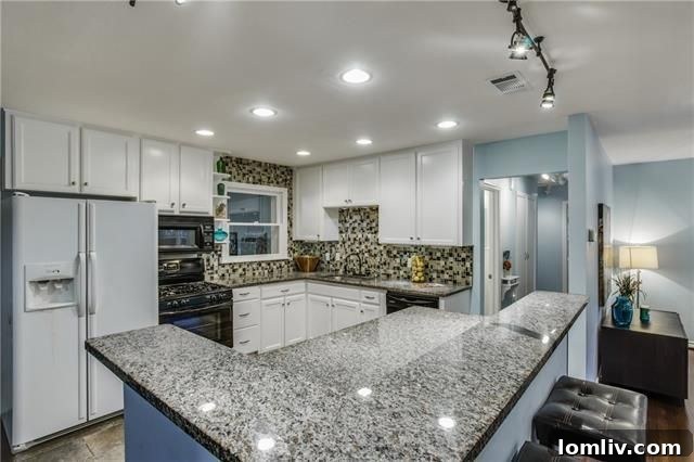 Close-up of kitchen with glass tile backsplash