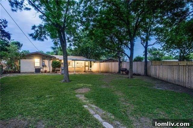 Lochwood Dallas Treasure Updated Traditional Home with a Dynamic Bonus Space 24 Full view of the backyard and house exterior