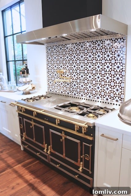 3608-Beverly-Dr-38 - 60-inch La Cornue range with Moroccan tile backsplash.