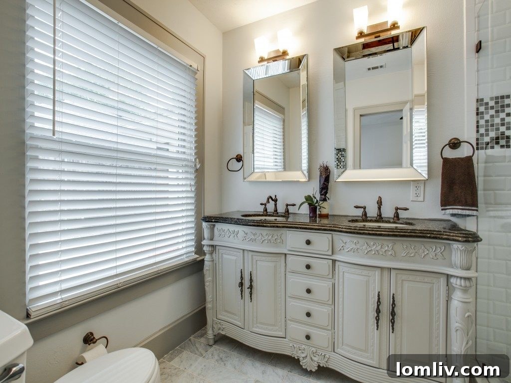 Iconic 1925 M Streets Prairie Craftsman: Timeless Charm, Ready for You 11 Spacious and bright bedroom at 5743 Mercedes Avenue