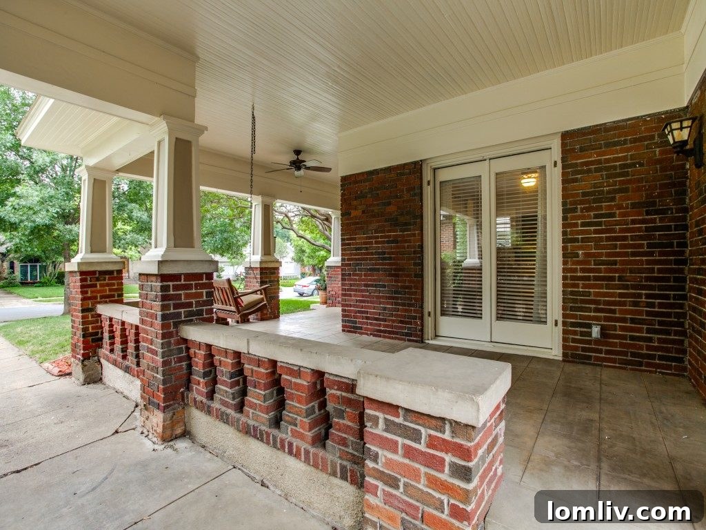 Iconic 1925 M Streets Prairie Craftsman: Timeless Charm, Ready for You 4 Front facade and lush landscaping of the 1925 M Streets cottage