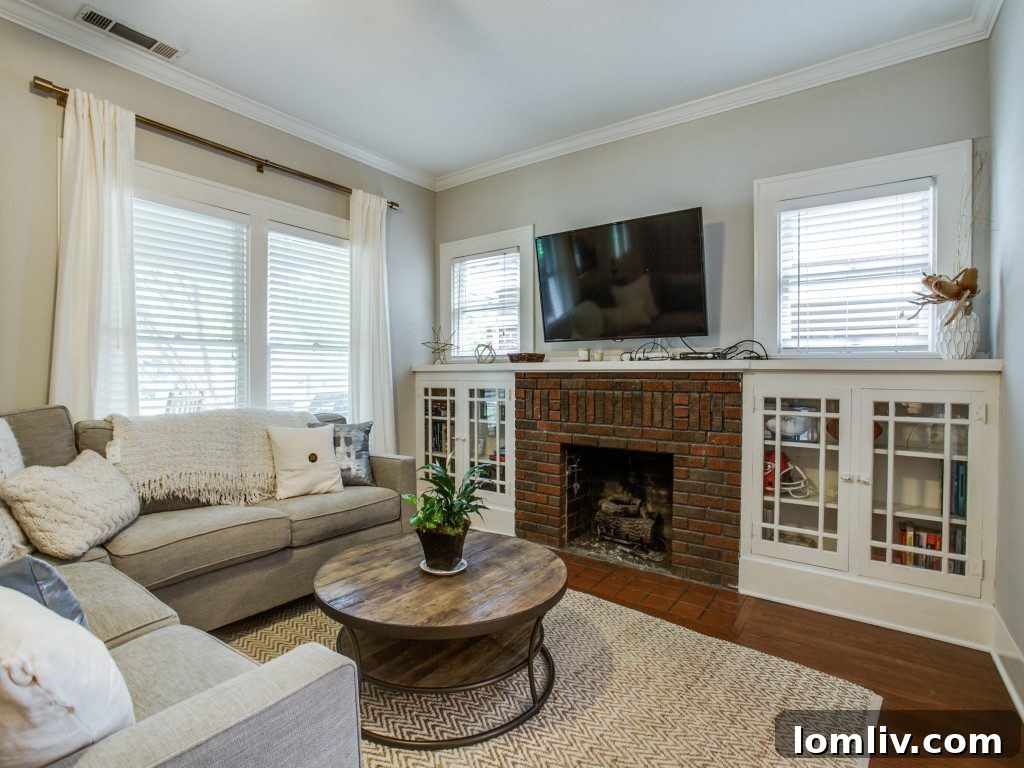 Iconic 1925 M Streets Prairie Craftsman: Timeless Charm, Ready for You 5 Inviting wrap-around porch, perfect for entertaining at 5743 Mercedes Avenue