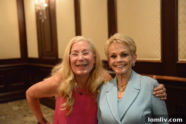 Candy Evans and Ellen Terry share a moment at the retirement celebration.