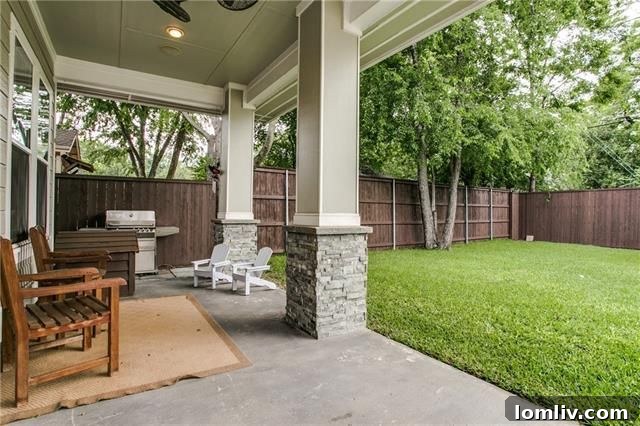 Spacious backyard with covered patio, ideal for outdoor entertaining