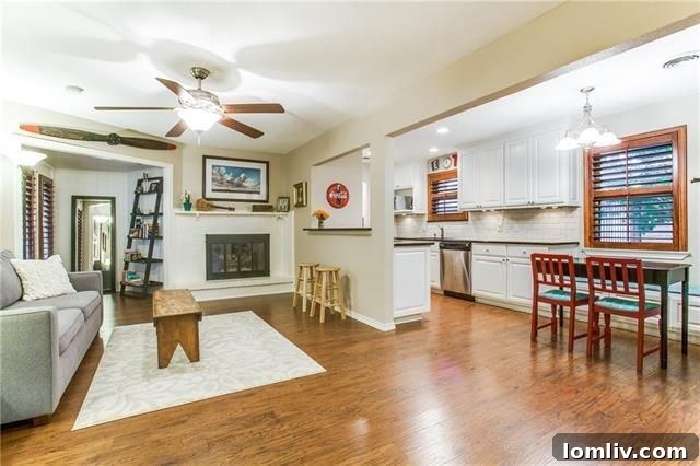 Cozy living room with fireplace and ample natural light