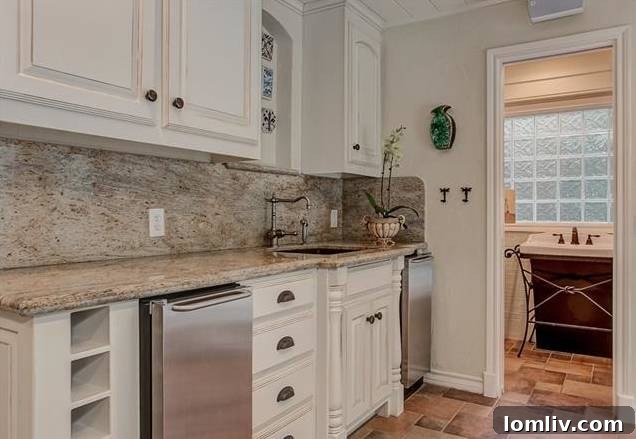 Bonus sitting area with wet bar serving as a poolside cabana room