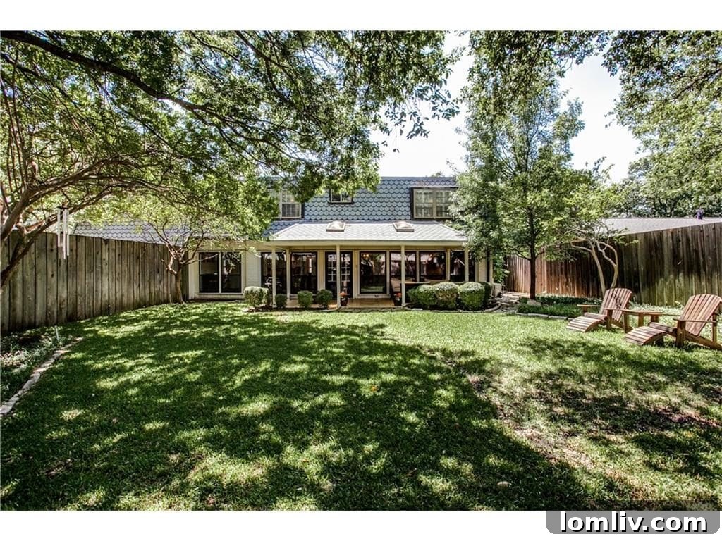 Another perspective of the rear yard, highlighting the potential for a pool or extensive garden.