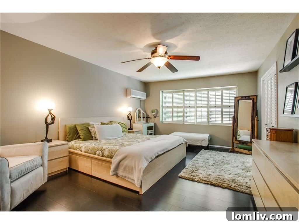 Luxurious master bedroom at 4939 Harvest Hill, offering comfort and style.