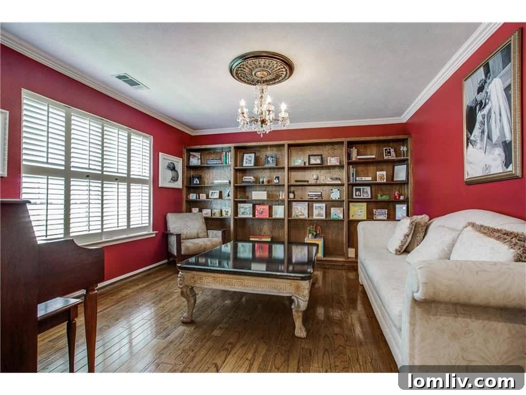 Spacious living room at 4939 Harvest Hill, highlighting its ample dimensions and potential for elegant decor.