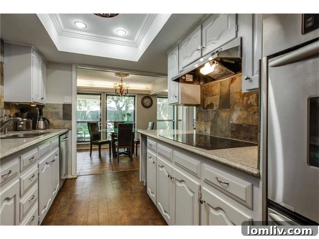 Gourmet range in the kitchen of 4939 Harvest Hill, perfect for culinary enthusiasts.