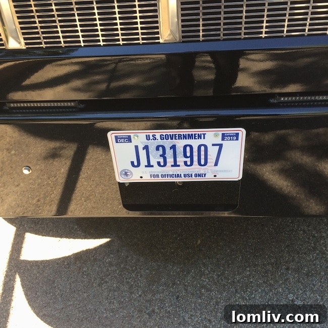 FBI-license-plate: An FBI vehicle with a distinct license plate parked near the search area.