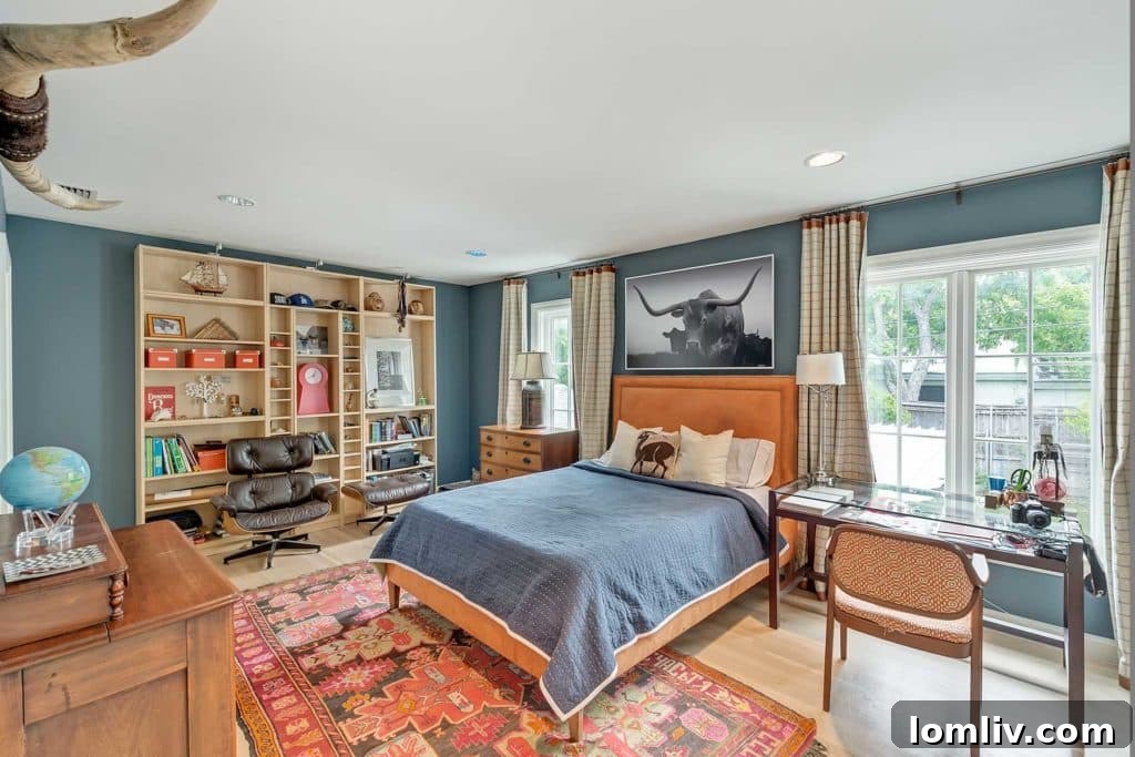 Another beautifully decorated upstairs bedroom with unique color palette