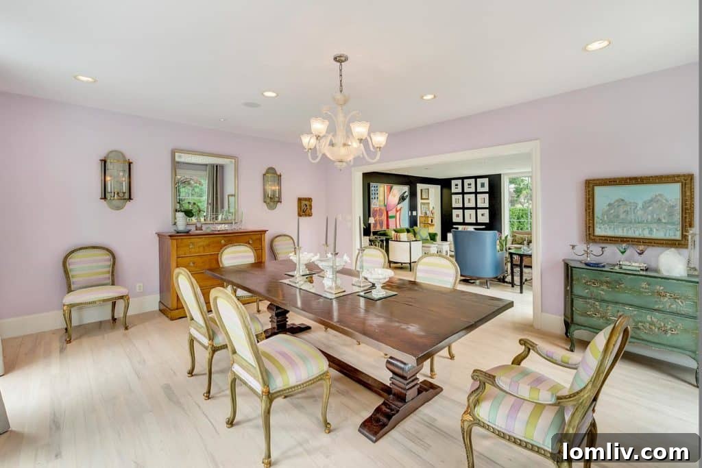 Elegant dining room with lavender walls and antique furniture