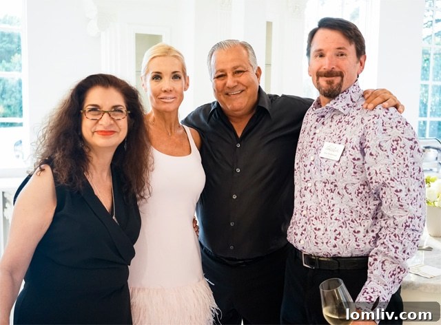 Adrian Leeds with home builders Sam and Debbie Elchami