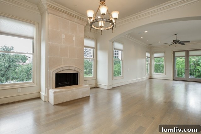 Luxurious Master Suite with Fireplace and Wall of Windows