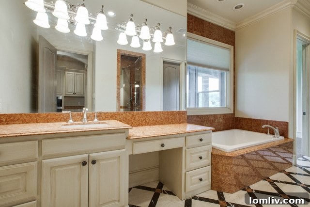 Elegant 'Hers' Master Bath with Vanity and Soaking Tub