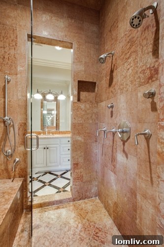 Spacious Double-Headed Shower Connecting Master Baths